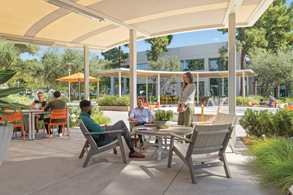 Lushly landscaped, centralized outdoor workspace.
